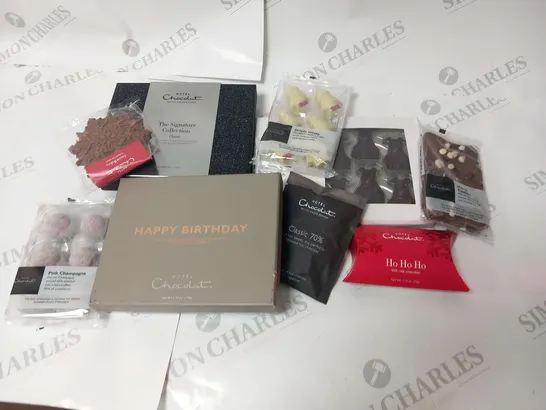 APPROXIMATELY 10 ASSORTED HOTEL CHOCOLAT PRODUCTS TO INCLUDE; MILK AND COOKIES SLAB, HO HO HO, THE SLEIGH TEAM, SIMPLE WHITE, HAPPY BIRTHDAY SIGNATURE, THE SIGNATURE COLLECTION CLASSIC AND PINK CHAMPA