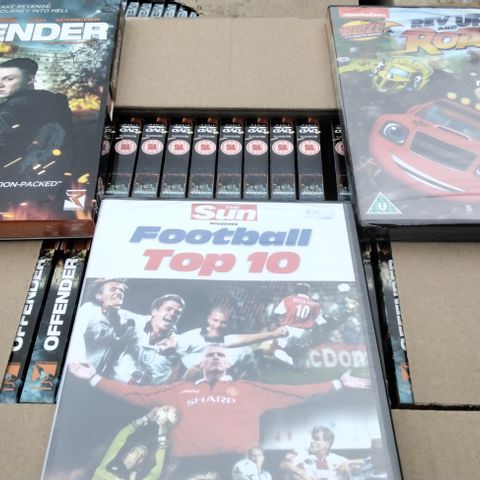 PALLET OF APPROXIMATELY 3300 NEW DVDS INCLUDING OFFEDER, FOOTBALL TOP 10, BLAZE REV UP AND ROAR