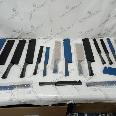 APPROXIMATELY 12 KNIFES OF VARIOUS SIZES AND COLOURS WITH SAFETY SEAL 