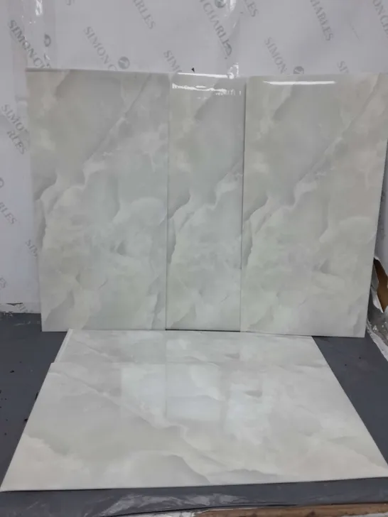 APPROXIMATELY 10 FAUX MARBLE WALL DECOR PIECES