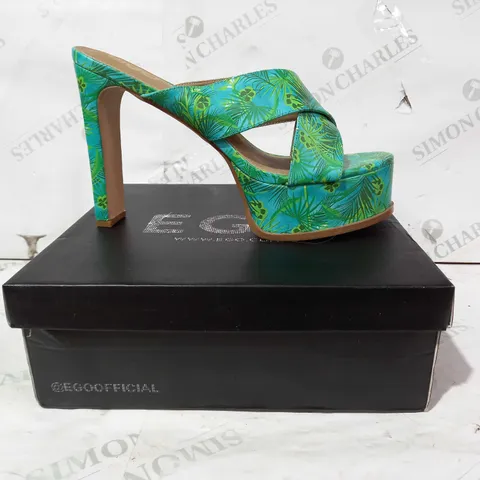 BOXED PAIR OF EGO EVERMORE PLATFORM HEELS IN GREEN WITH LEAF PATTERN UK SIZE 9