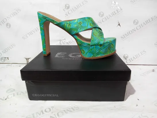 BOXED PAIR OF EGO EVERMORE PLATFORM HEELS IN GREEN WITH LEAF PATTERN UK SIZE 9