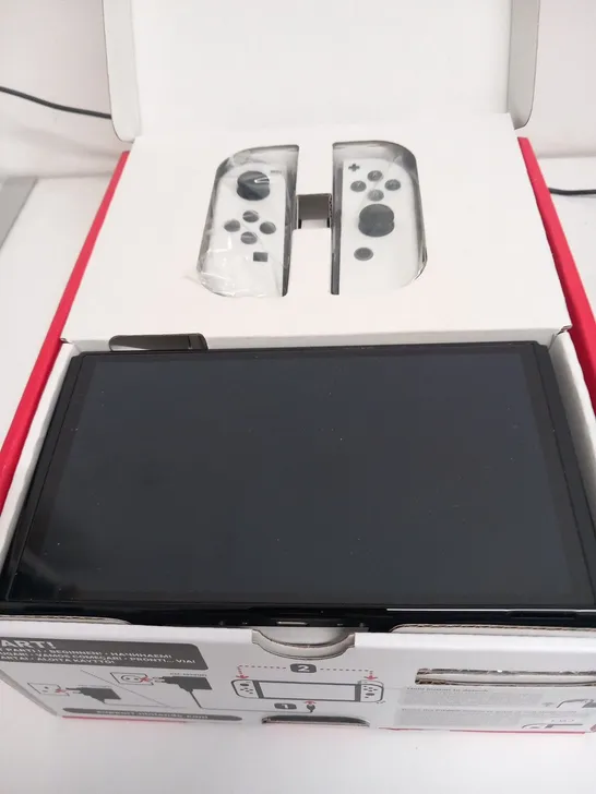 BOXED NINTENDO SWITCH OLED MODEL