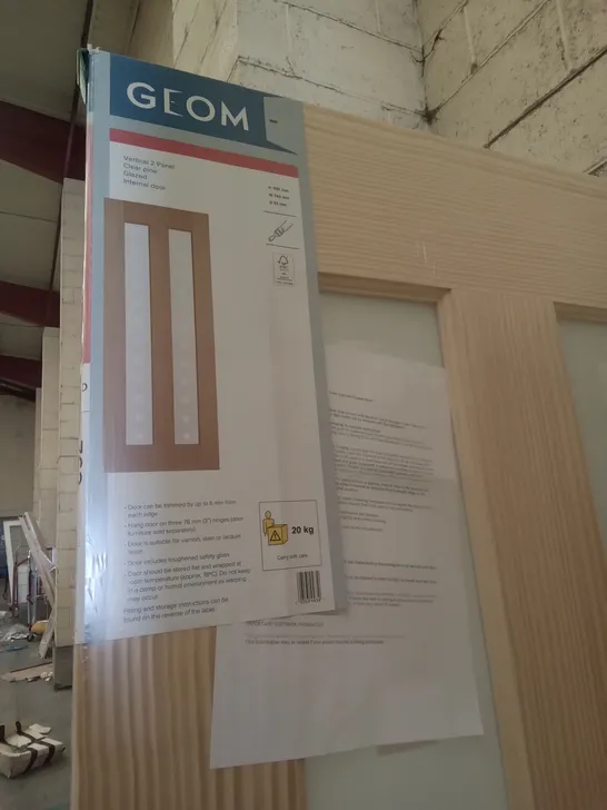 PACKAGED GEOM 762 X 1981MM VERTICAL 2 PANNEL CLEAR PINE GLAZED INTERNAL DOOR