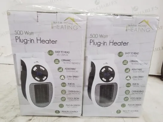 TWO BOXED 500 WATT PLUG IN HEATERS 