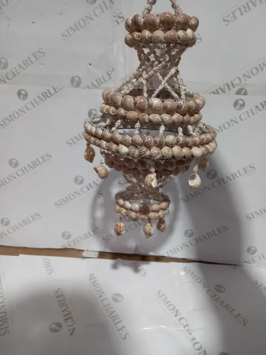 DECORATIVE LAYERED SHELL HANGING PIECE