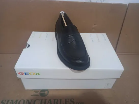 BOXED PAIR OF GEOX SLIP ON SHOES IN BLACK EU SIZE 35
