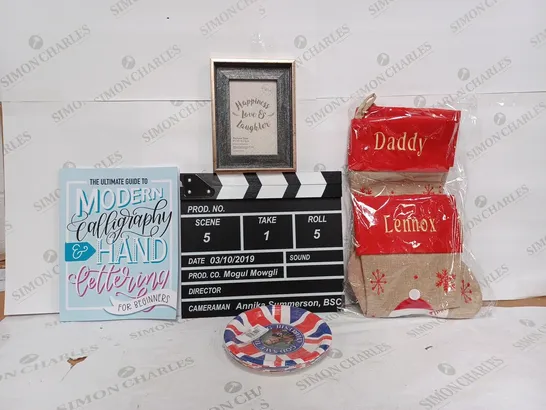 BOX OF APPROX 20 ASSORTED ITEMS TO INCLUDE - KING CHARLES PAPER PLATES - CHRISTMAS STOCKINGS - MOVIE SET CLAPPER BOARD ECT