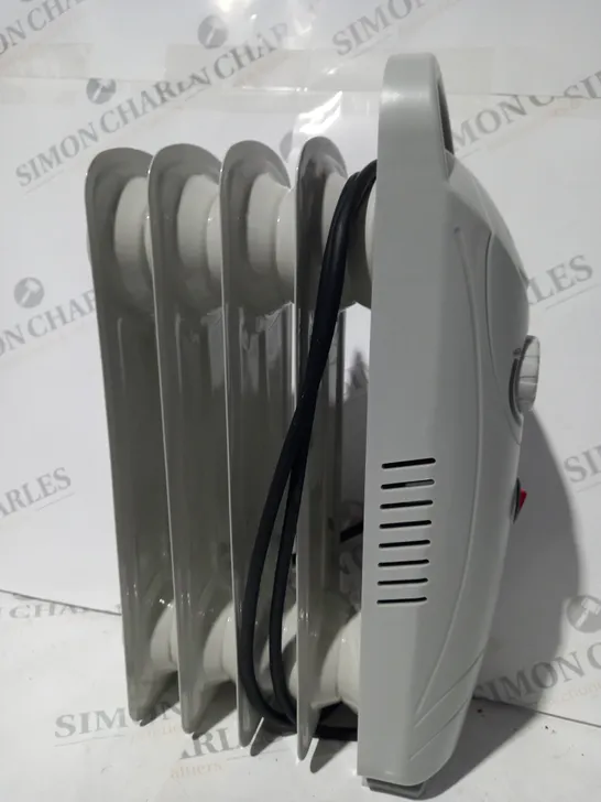 BOXED SWAN OIL HEATER IN WHITE RRP £19