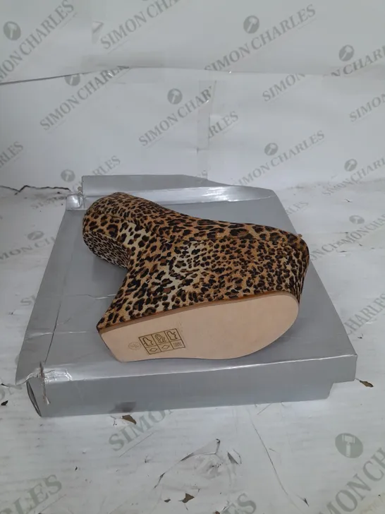 BOXED PAIR OF CASANDRA PLATFORM STRAP HEEL IN LEOPARD SUEDE SIZE 6