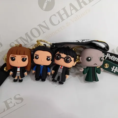 BOX OF APPROX 7 ASSORTED HARRY POTTER KEYCHAINS 