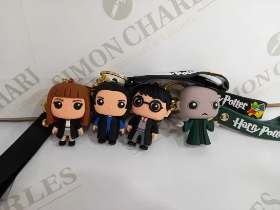 BOX OF APPROX 7 ASSORTED HARRY POTTER KEYCHAINS 