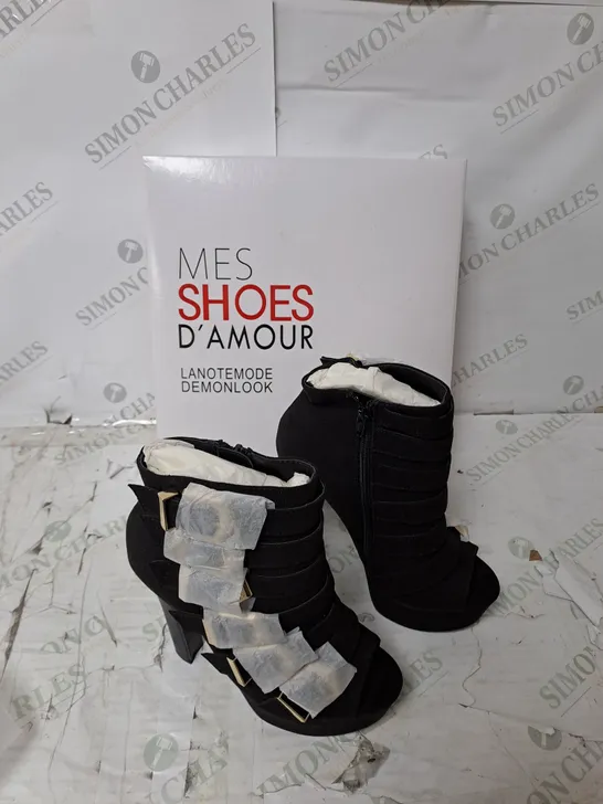 APPROXIMATELY 12 PAIRS OF BOXED MES SHOES D'AMOUR DEMONLOOK VIXEN BLACK HEELS - SIZE VARIATION 