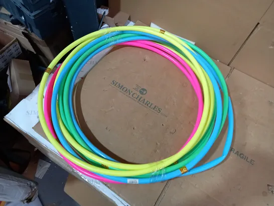 LOT OF APPROXIMATELY 8 ASSORTED DESIGNER HULA HOOPS