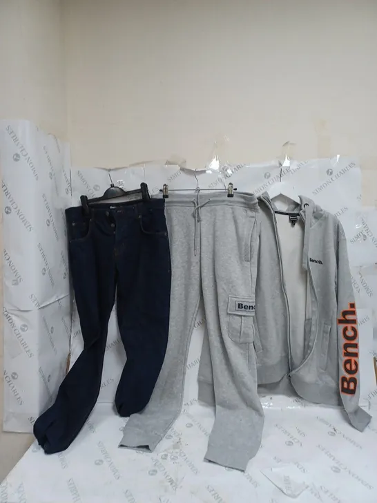 12 ASSORTED BENCH PIECES OF CLOTHING TO INCLUDE T-SHIRT, JACKETS, AND SWEATPANTS ETC. 