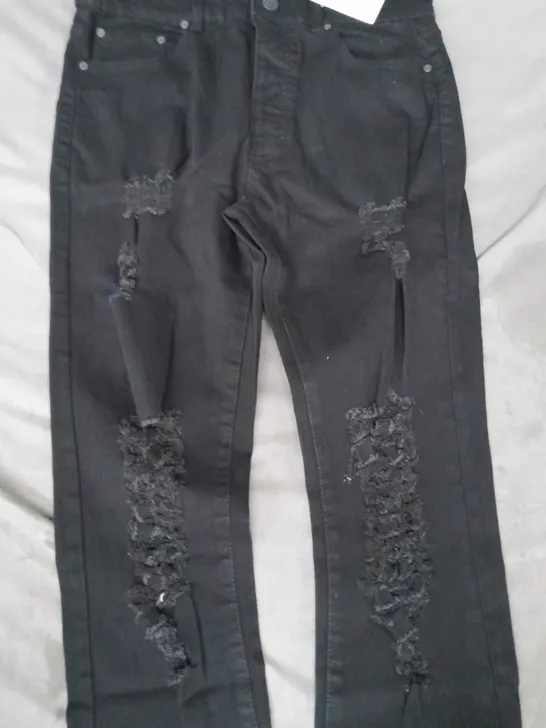 BOOHOO MAN TALL SKINNY JEANS WITH ALL OVER RIPS IN BLACK SIZE 32R