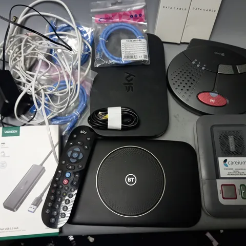 LOT OF ASSORTED TECH ITEMS TO INCLUDE ROUTERS, REMOTES, USB HUB AND DATA CABLES