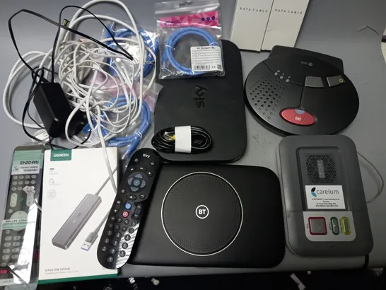 LOT OF ASSORTED TECH ITEMS TO INCLUDE ROUTERS, REMOTES, USB HUB AND DATA CABLES