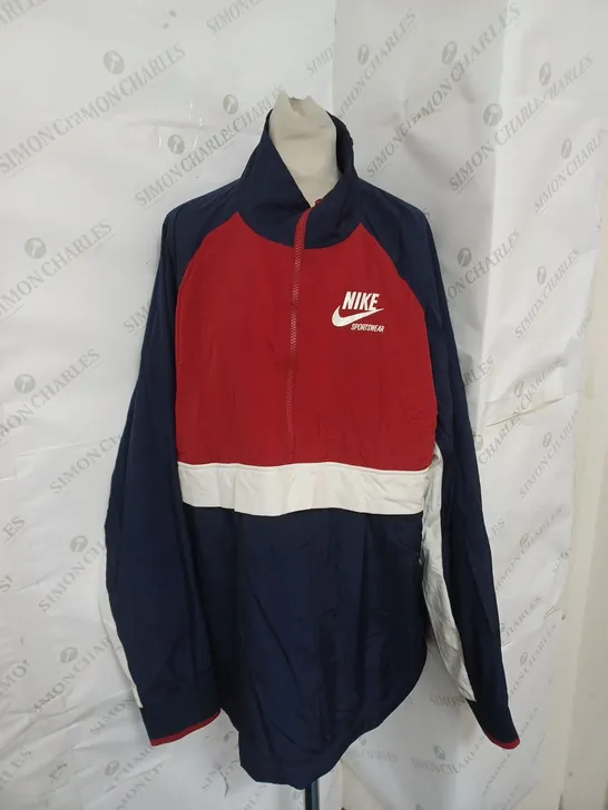 NIKE WATERPROOF JACKET IN RED/WHITE/BLUE SIZE XL