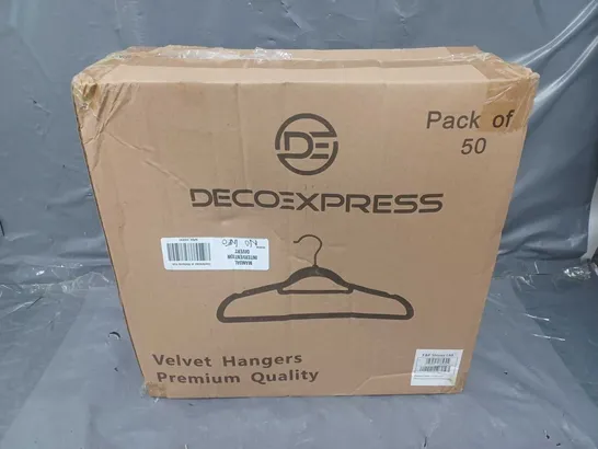 APPROXIMATELY 50 BOXED DECO EXPRESS VELVET HANGERS IN PINK