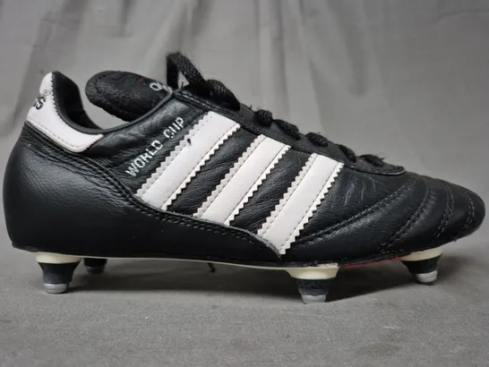 BOXED PAIR OF ADIDAS WORLD CUP FOOTBALL BOOTS IN BLACK/WHITE UK SIZE 4