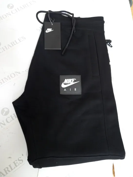 NIKE AIR TRACKSUIT BOTTOMS SIZE L 