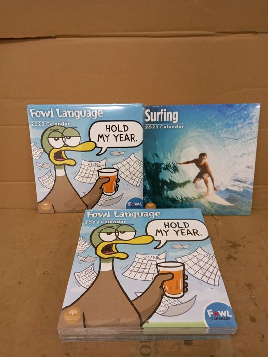 LOT OF APPROXIMATELY 15 SEALED BRIGHT DAY COMPANY 2022 CALENDARS TO INCLUDE SURFING AND FOWL LANGUAGE