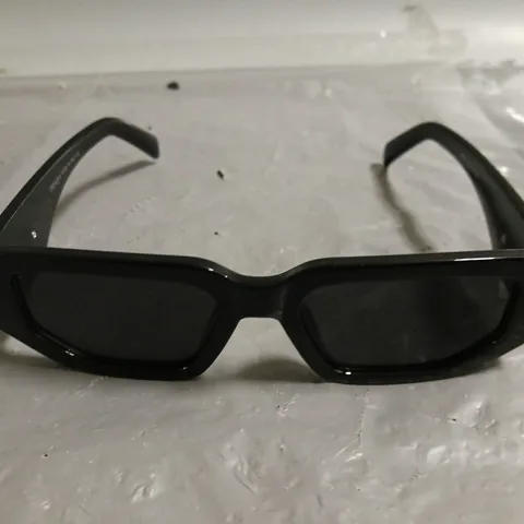 PAIR OF PRADA CHUNKY BLACK FRAMED GLASSES IN CASE