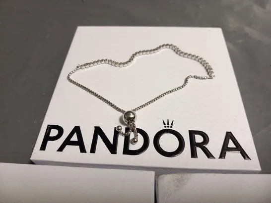 FOUR ASSORTED PANDORA PRODUCTS TO INCLUDE; BRACELTS AND CHARMS