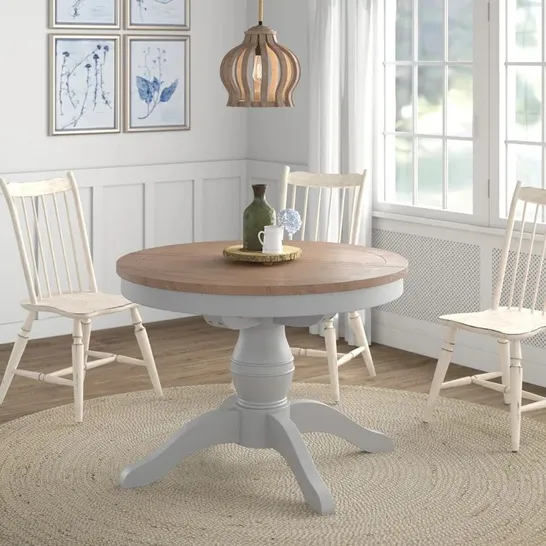 BOXED OLIVIANA EXTENDABLE SOLID OAK PEDESTAL DINING TABLE