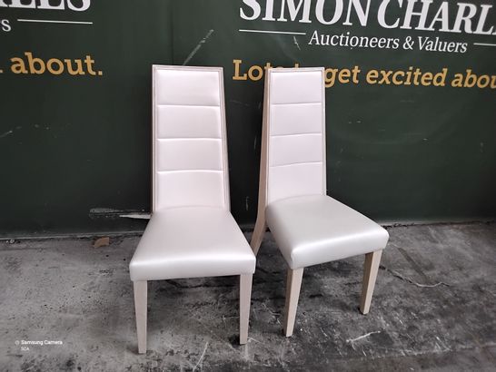 PAIR OF DESIGNER WHITE PU UPHOLSTERED HIGH BACKED DINING CHAIRS 