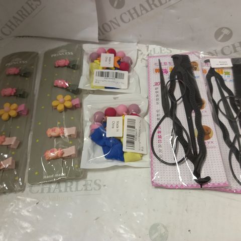 LOT OF APPROX 30 ASSORTED HAIR ACCESSORY ITEMS TO INCLUDE HAIR CLIPS, HAIR TIES, COMBS