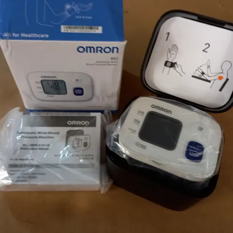 BOXED OMRON RS2 AUTOMATIC WRIST BLOOD PRESSURE MONITOR