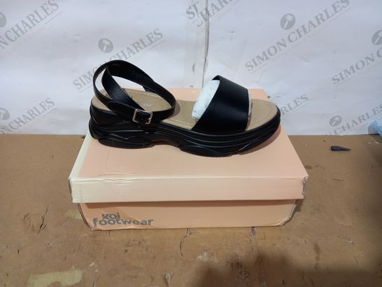 BOXED PAIR OF KOI FOOTWEAR BLACK SANDALS SIZE 7