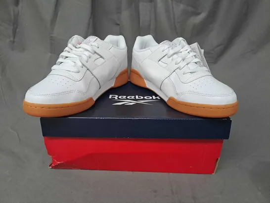 BOXED PAIR OF REEBOK WORKOUT PLUS SHOES IN WHITE UK SIZE 7