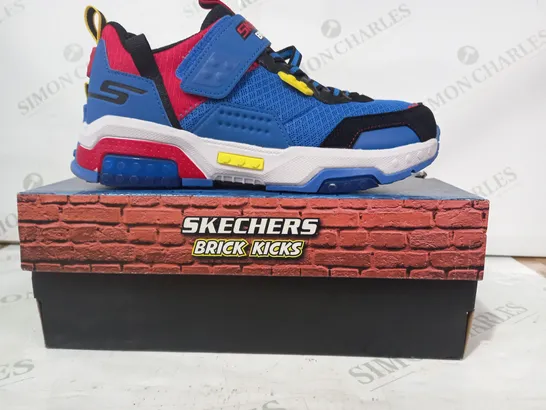 BOXED PAIR OF SKECHERS BRICK KICKS TRAINERS IN BLUE/RED/YELLOW UK SIZE 3.5