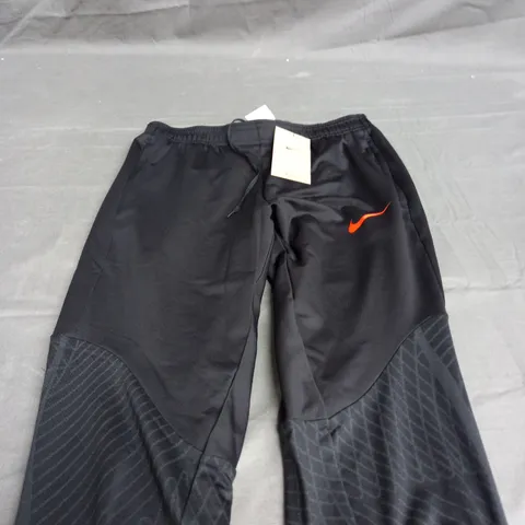 NIKE WOMENS TRACKSUIT PANTS IN BLACK - S