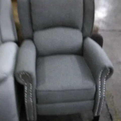DESIGNER GREY FABRIC RECLINING ARMCHAIR WITH STUDDED DETAIL