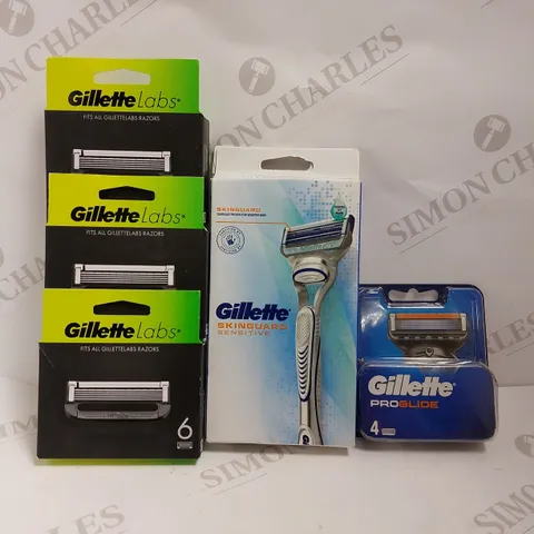 BOX OF APPROX 5 ITEMS TO INCLUDE GILETTE SKINGUARD RAZOR AND ASSORTED RAZOR BLADES