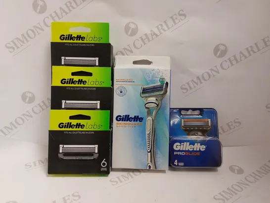 BOX OF APPROX 5 ITEMS TO INCLUDE GILETTE SKINGUARD RAZOR AND ASSORTED RAZOR BLADES