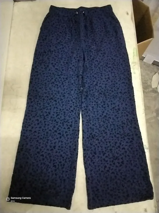 BOX OF APPROXIMATELY 17 DANNII MINOGUE NAVY HEART FLOCKED WIDE LEG TROUSERS PETITE - SIZE 10