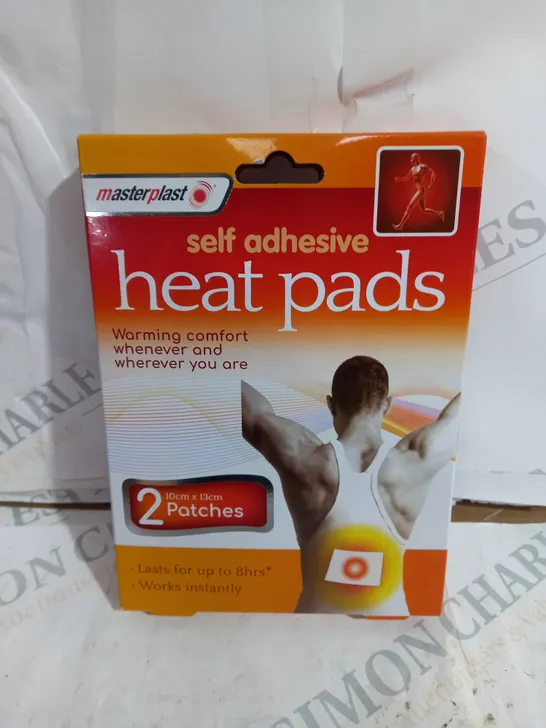 BOX OF APPROX 10 MASTERPLAST HEAT PADS SELF ADHESIVE 2 PACK