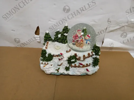 WERCHRISTMAS SNOW GLOBE AND FEATURE