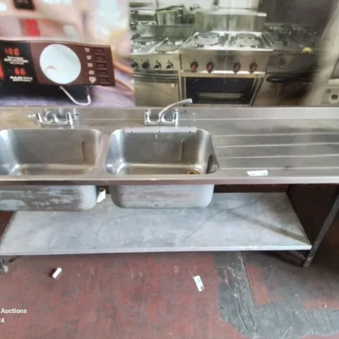 LARGE COMMERCIAL KITCHEN STAINLESS STEEL DOUBLE SINK AND DRAINAGE AREA