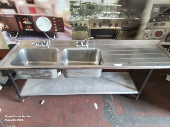 LARGE COMMERCIAL KITCHEN STAINLESS STEEL DOUBLE SINK AND DRAINAGE AREA