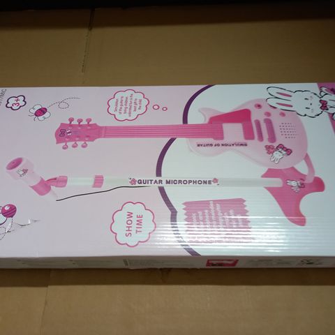 BOXED PEPPA PIG GUITAR AND MICROPHONE SET