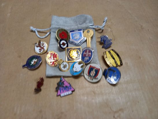 LOT OF 17 ASSORTED BADGES