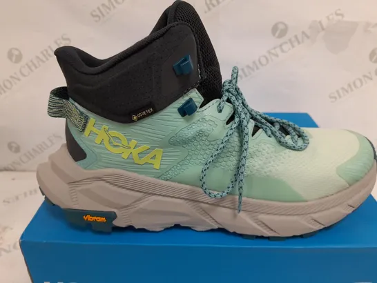 BOXED PAIR OF HOKA WOMENS TRAIL CODE GORE-TEX BOOTS IN LIGHT BLUE/GREEN/GREY - UK 9.5