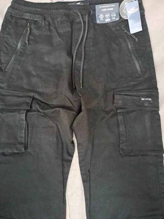 HOLLISTER ADVANCED STRETCH CARGO JOGGER PANTS IN BLACK SIZE MEDIUM