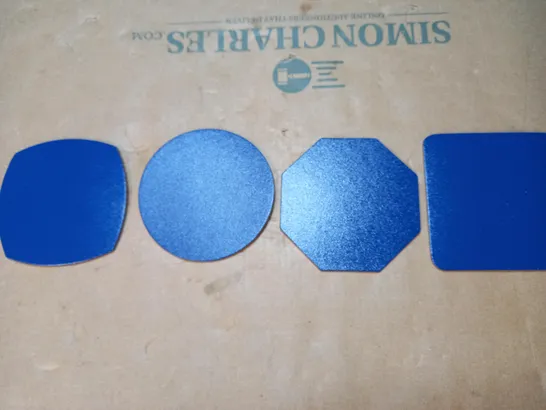 BOX OF APPROXIMATELY 300 CORK BACKED BLUE FLEXIBLE COASTERS IN ASSORTED SHAPES